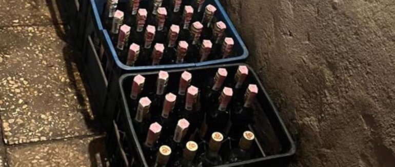 Трьох ужгородців викрили на виготовлені фальсифікованого алкоголю